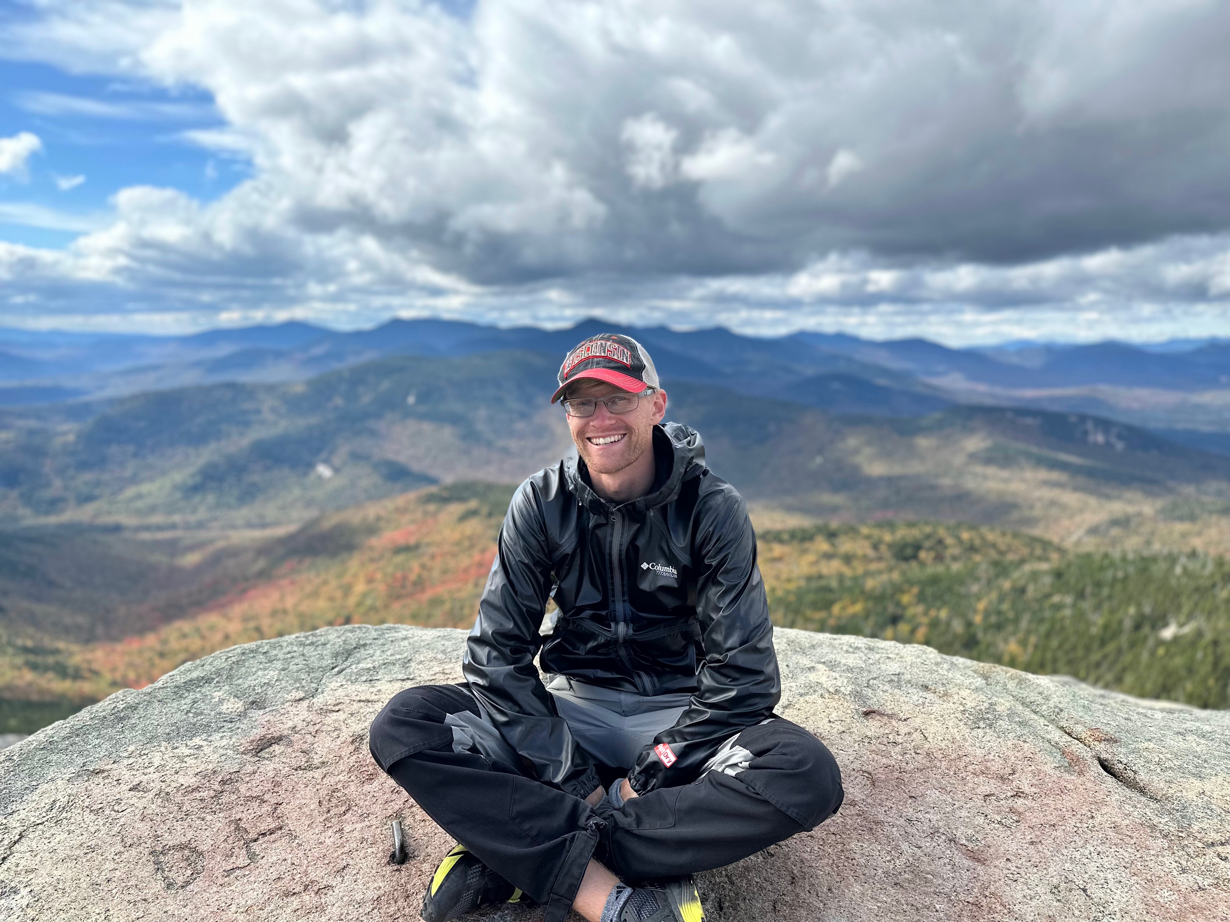 Cale sitting on a rock